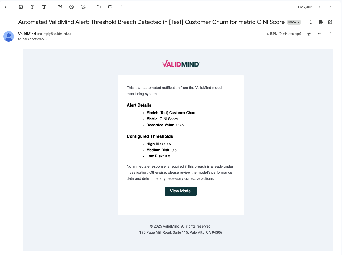 An email interface displays a notification from ValidMind with a subject line stating Automated ValidMind Alert: Threshold Breach Detected in [Test] Customer Churn for metric GINI Score. The email body contains a centered white box with a gray border, titled ValidMind in pink at the top. Inside, it details Alert Details with Model: [Test] Customer Churn, Metric: GINI Score, and Recorded Value: 0.75. Below, it lists Configured Thresholds with High Risk: 0.7 and Low Risk: 0.6, followed by a message indicating no immediate response is required. A green button labeled View Model is centered at the bottom. The footer contains ValidMinds address and copyright information in gray text.